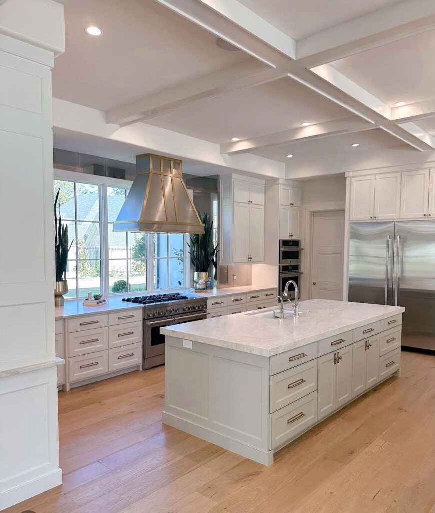 kitchen with white counter tops and stainless appliances